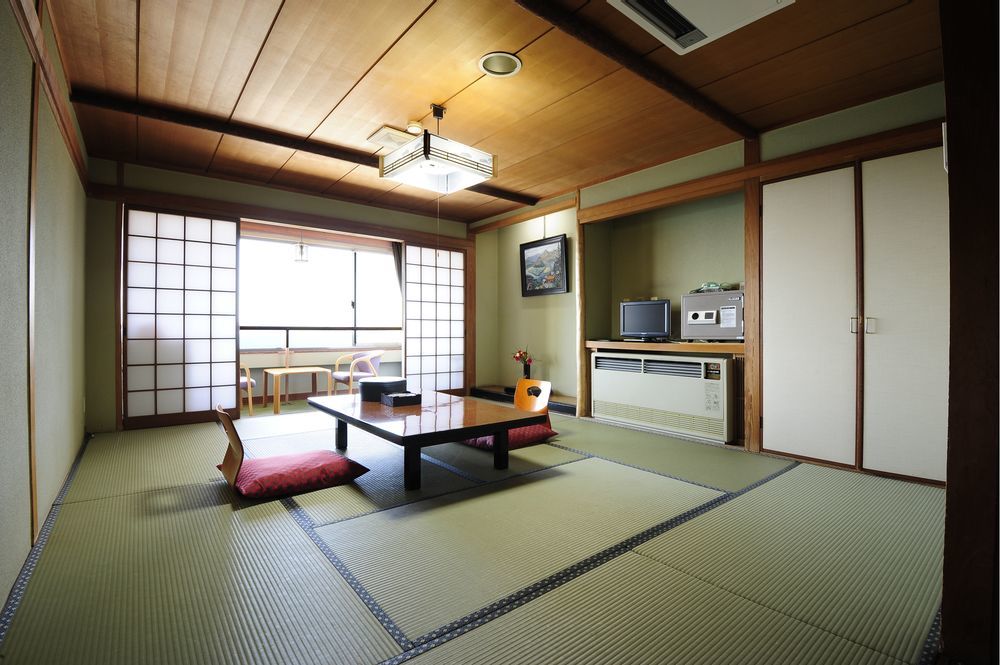 Uguisuya Ryokan Unzen Bagian luar foto